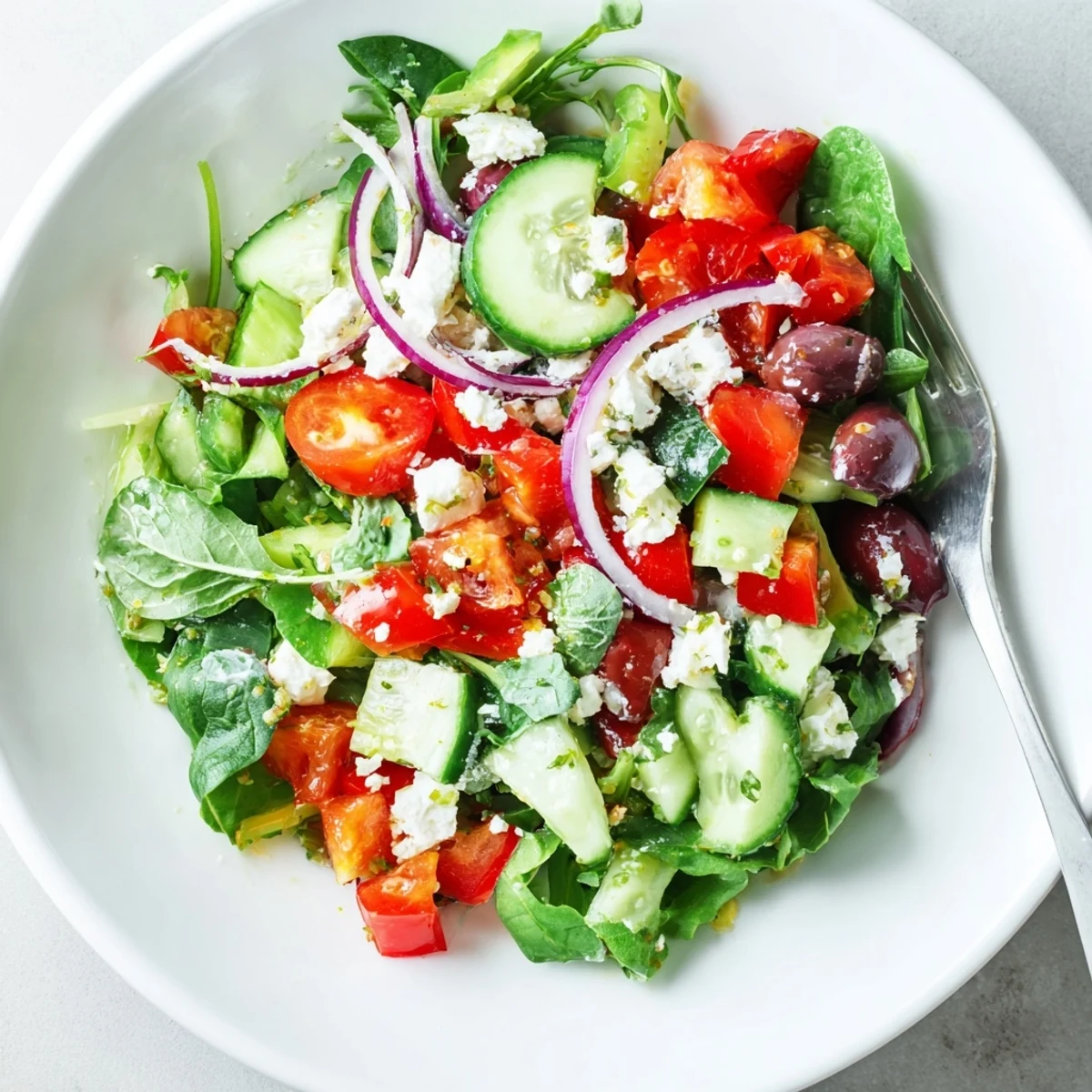 Fresh Salad Recipe: crisp greens, juicy cherry tomatoes, tossed in lemon dressing.
