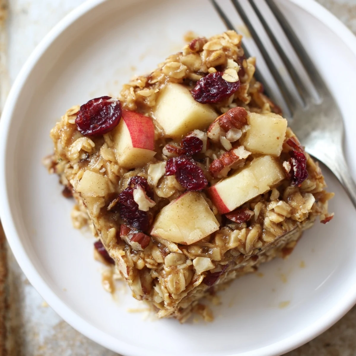 Bubbly, cinnamon-scented Delicious Apple Cinnamon Oatmeal Bake Recipe For Mornings