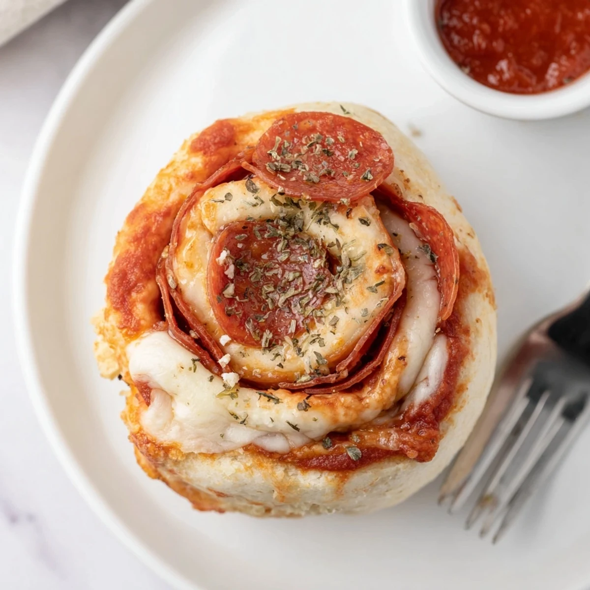 Warm, bite-sized spirals of soft dough filled with pepperoni, Gluten Free Pizza Rolls Snack